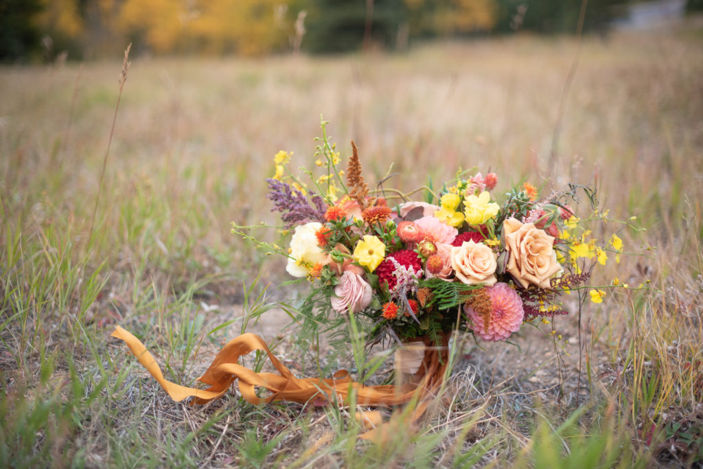 Analogous bridal bouquet with peach, yellow and orange